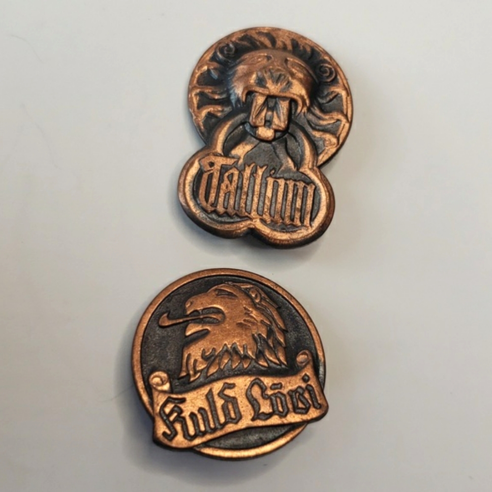 Set of 2 vintage copper and black Lion pin brooches